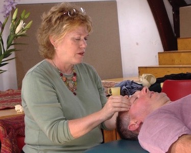 Judith Sullivan using CranioSacral therapy to help the body heal naturally.